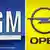 The GM logo with a blue background, left, and the Opel logo with a yellow background