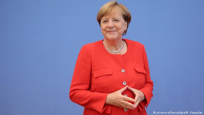 Merkel Raute (photo-alliance / dpa / M. Kappeler)