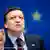 Jose Manuel Barroso standing in front an EU flag