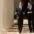 Gordon Brown and Barack Obama walking at the White House