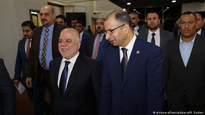 Спікер іракського парламенту Салім Джабурі (праворуч) із прем'єр-міністром Іраку Хайдером аль-Абаді (ліворуч)