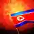 Флаг КНДР на фоне взрыва водородной бомбы