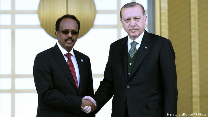 Turkey's President Recep Tayyip Erdogan, right, shakes hands with Somalia's President Mohamed Abdullahi Mohamed, also known as Farmajo, at the Presidential palace in Ankara, Turkey