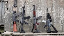 The weapons of rebels of Colombia's Marxist National Liberation Army (ELN) lean against a wall of a farmer's home, in the northwestern jungles, Colombia August 31, 2017. Picture taken August 31, 2017. REUTERS/Federico Rios