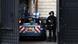 Police car passes through gate of Paris court Police car passes through gate of Paris court