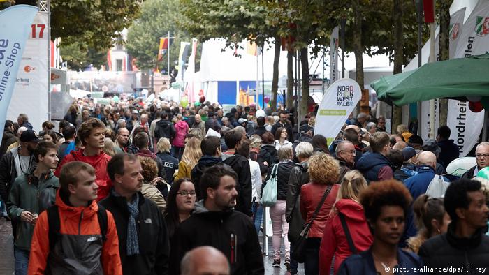 People attend a festival for Day of German Unity in Mainz