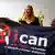 ICAN  executive Beatrice Fihn (M) holding banner