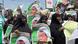 Women in black niqabs holding up posters calling for the release of Ibrahim Zakzaky Women in black niqabs holding up posters calling for the release of Ibrahim Zakzaky
