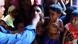 A Rohingya refugee child reacts as a Bangladeshi volunteer administers an oral cholera vaccine to her father A Rohingya refugee child reacts as a Bangladeshi volunteer administers an oral cholera vaccine to her father