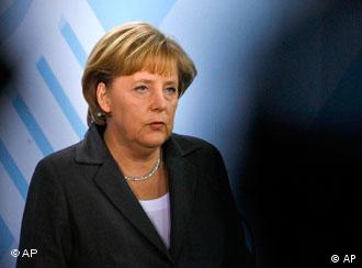 A victim's coffin is carried on the cemetery in Winnenden