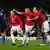 Manchester United's Nemanja Vidic, third left, reacts with teammate Rio Ferdinand, third right, after scoring