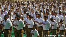 Volunteers of the Hindu nationalist organisation Rashtriya Swayamsevak Sangh (RSS) take part in the Path-Sanchalan, or Route March during celebrations to mark the Vijaya Dashmi, or Dussehra, in Ajmer, India, September 30, 2017. REUTERS/Himanshu Sharma