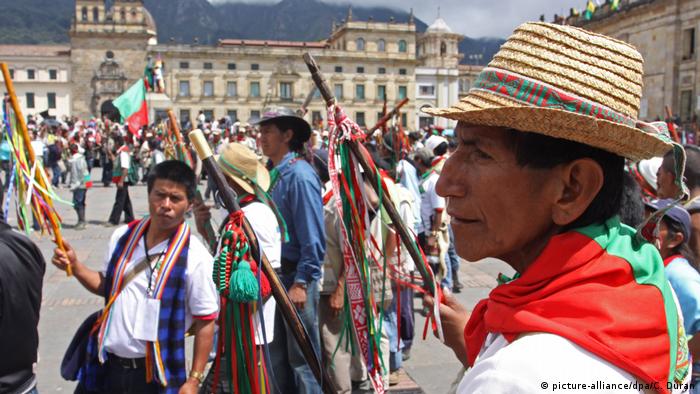 A Colombian indigenous group participate in a march in Bogota