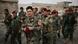 Eine Gruppe von Peschmerga-Kämpfern in der Ortschaft Sheikh Amir (Foto: Reuters/M. Bosch) Eine Gruppe von Peschmerga-Kämpfern in der Ortschaft Sheikh Amir (Foto: Reuters/M. Bosch)