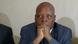 Merera Gudina seated with his head propped on his hands Merera Gudina seated with his head propped on his hands