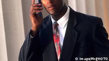 Black african american male business man talking on the phone to communicate with other office McPBBA McPBBA
Black African American Male Business Man Talking ON The Phone to communicate With Other Office McPBBA McPBBA