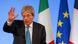 Italian Prime Minister Paolo Gentiloni waves his hand Italian Prime Minister Paolo Gentiloni waves his hand