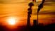 The silhouette of a coal power plant in Germany during sunset The silhouette of a coal power plant in Germany during sunset