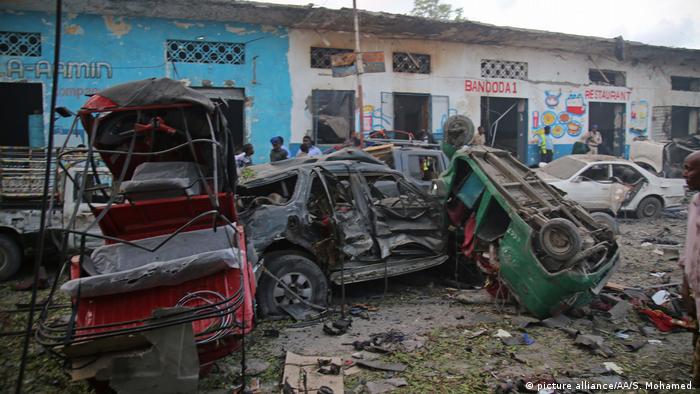 Cars were turned upside down by the bomb blasts in Mogadishu