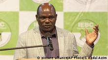 Independent Electoral and Boundaries Commission chief Wafula Chebukati, briefs media about the on-going vote counting, in Nairobi, Kenya, Sunday, Oct. 29, 2017. Chebukati had previously said he could not guarantee the credibility of the election vote, but declared Sunday that the election has gone well, and he would soon announce a plan for four out of Kenya's 47 counties where voting was postponed. (AP Photo/Sayyid Abdul Azim) |