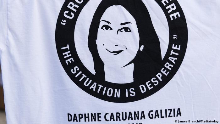 A t-shirt shows the face of murdered journalist Caruana Galizia