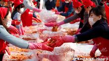 People take part in the Seoul Kimchi Festival in central Seoul, South Korea, November 3, 2017. REUTERS/Kim Hong-Ji