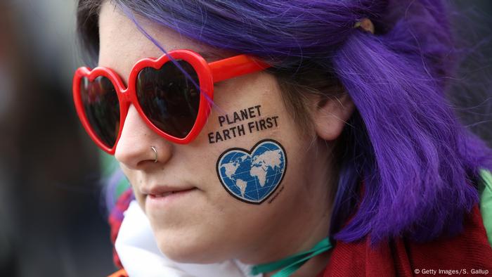 Girl with Planet earth first on her face