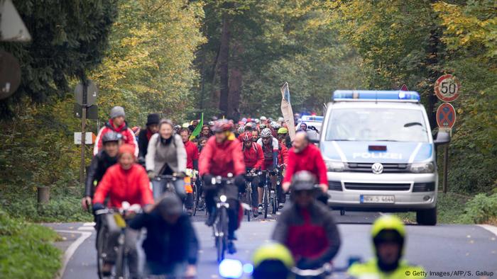 Cyclists are accompanied by police