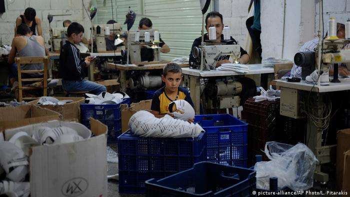 Refugees in a shoe workshop in Turkey