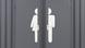 A toilet logo shows half a man and half a woman A toilet logo shows half a man and half a woman