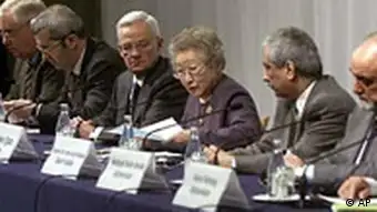 Chairperson Sadako Ogata, third from right, opens a joint press conference in Tokyo following the Afghan Reconstruction Conference Tuesday Jan. 22, 2002. From left to right are, the conference co-chairs, European Commission External Relations Commissioner Christopher Patten, Spanish Secretary of State for Foreign Affairs Miguel Nadal, U.S. Treasury Secretary Paul O'Neill, Ogata, Saudi Arabian Minister of Finance Ibrahim bin Abdul-Aziz Al-Assaf, and Afghan Minister of Finance Hedayat Amin Arsala. The conference closed Tuesday with pledges of more than 4.5 billion U.S. dollars for war-torn Afghanistan. (AP Photo/David Guttenfelder)
