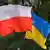 Прапори Польщі та України на тлі дерев