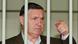 Former mafia boss Toto Riina is seen behind bars during a trial in Rome Former mafia boss Toto Riina is seen behind bars during a trial in Rome