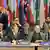 صحنه‌ای از کنفرانس افغانستان در لاهه - در عکس حامدکرزای، رئیس جمهور افغانستان و بان کی مون، دبیر کل سازمان ملل متحد دیده می‌شوند