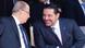 Presidente Aoun e Hariri durante uma parada militar em Beirute Presidente Aoun e Hariri durante uma parada militar em Beirute