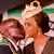 A file photo showing the then Zimbabwe President Robert Mugabe kissing his wife Grace Mugabe during the country's 37th Independence Day celebrations.