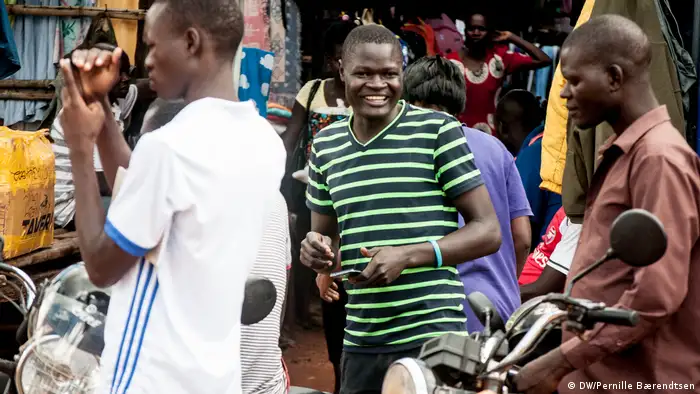 Michael Ojok on the street in Gulu during a field work session at the DWA training in 2017.