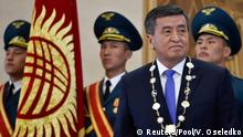 Kyrgyz President-elect Sooronbai Jeenbekov (front) attends an inauguration ceremony at the Ala-Archa state residence outside Bishkek, Kyrgyzstan November 24, 2017. REUTERS/Vyacheslav Oseledko/Pool