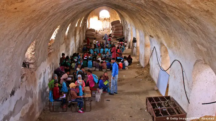 Children in a barn in Syria (Getty Images/AFP/M. Abazeed)