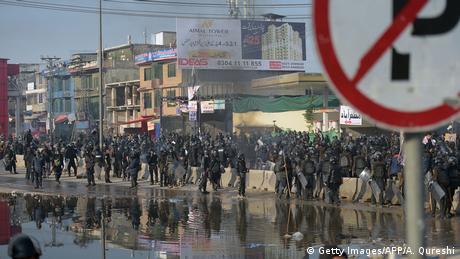 Riot policemen gather during a clash with protesters of the Tehreek-i-Labaik Yah Rasool Allah Pakistan (TLYRAP) religious group.