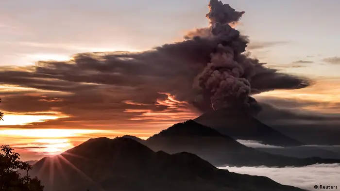 A huge cloud spews from Mount Agung in Bali