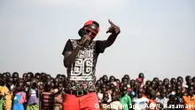 Art to enhance social cohesion: Angel G, a South Sudanese refugee singer, performs during Bidibidis Got Talent auditions at a refugee settlement in Northern Uganda.