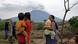 Bali women and children observe the volcanic eruption Bali women and children observe the volcanic eruption