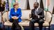 German Chancellor Angela Merkel sits on a sofa talking with Ivory Coast President Alassane Ouattara German Chancellor Angela Merkel sits on a sofa talking with Ivory Coast President Alassane Ouattara