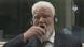 Praljak drinking from a glass bottle in the Hague courtroom Praljak drinking from a glass bottle in the Hague courtroom
