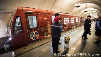 Moscow's football-themed metro train pulls into a station