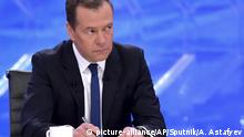 Russian Prime Minister Dmitry Medvedev speaks during a TV interview broadcast in Moscow, Russia, Thursday, Nov. 30, 2017. Medvedev said he has no intention of suing opposition leader Alexei Navalny, who has criticized his alleged ill-gotten wealth, as it would only help him win more publicity. (Alexander Astafyev, Sputnik, Government Pool Photo via AP) |