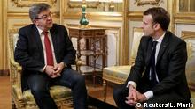 21.11.2017 *** French President Emmanuel Macron (R) talks with Jean-Luc Melenchon, leader of Far-left opposition France Insoumise (France Unbowed) party, in his office at the Elysee Palace in Paris, France, November 21, 2017. REUTERS/Ludovic Marin/Pool