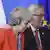Jean-Claude Juncker und Theresa May