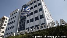 The Greek flag flies outside the Stock Exchange building in Athens, Greece, 03 August 2015. The Greek stock exchange opened 03 August after a month and immediately fell by just under 23 per cent. The stock market was closed as part of the capital controls imposed by the Greek government on 29 June to prevent money from fleeing the country and a collapse of the banking system. Greeks have withdrawn billions of euros from their accounts since then over fears of a banking crash. EPA/ALEXANDROS VLACHOS +++(c) dpa - Bildfunk+++ |